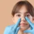 A woman with markings for reconstructive surgery on her nose in Providence UT